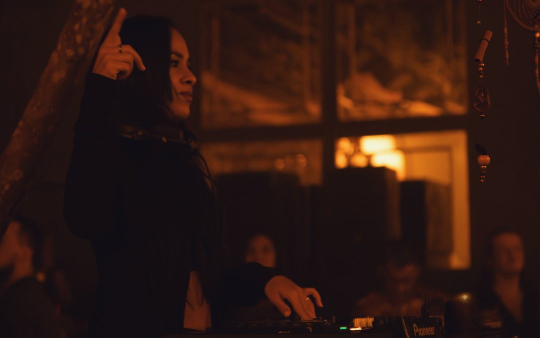 Maya Fourteen performing behind the decks